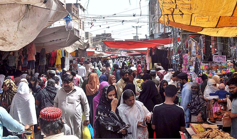 People busy in shopping for upcoming Eid ul Fitr festival at Urdu bazar.