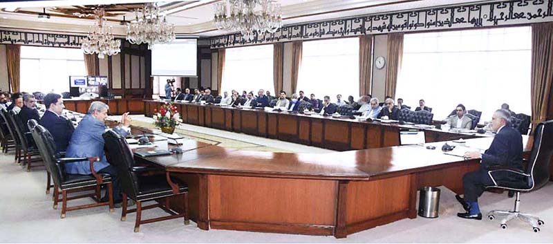 Federal Minister for Finance and Revenue Senator Mohammad Ishaq Dar presiding over the meeting of the Economic Coordination Committee (ECC) of the Cabinet