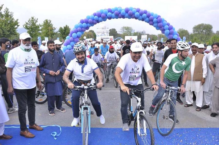 Deputy commissioner Irfan Memon participating in cycle rally during 1-Day to go Run & Ride rally organized by District Health office in collaboration with UNICEF at F-9 park.