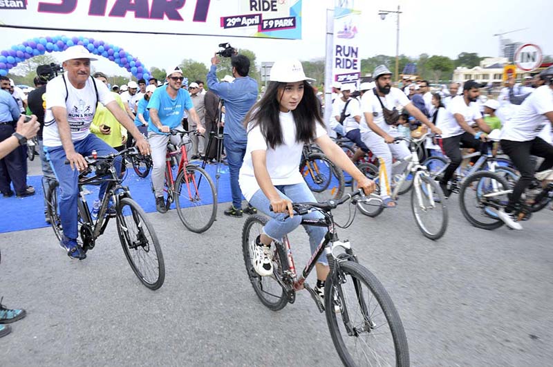 Deputy commissioner Irfan Memon participating in cycle rally during 1-Day to go Run & Ride rally organized by District Health office in collaboration with UNICEF at F-9 park.