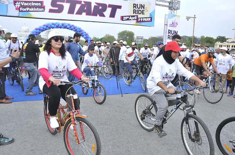 Deputy commissioner Irfan Memon participating in cycle rally during 1-Day to go Run & Ride rally organized by District Health office in collaboration with UNICEF at F-9 park.