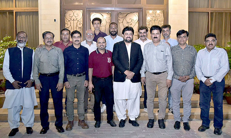 A group photo of Governor Sindh Kamran Tessori along with the representatives of Pakistan Association of Press Photojournalist (PAPP) on the occasion of Iftar-dinner at the Governor House