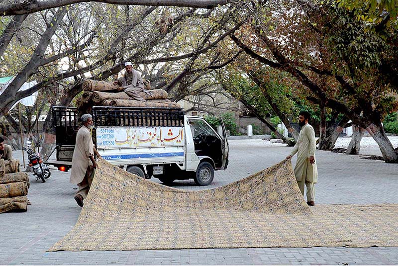 People busy in preparation for Eid-ul-Fitr prayer at Eid Gah Mosque