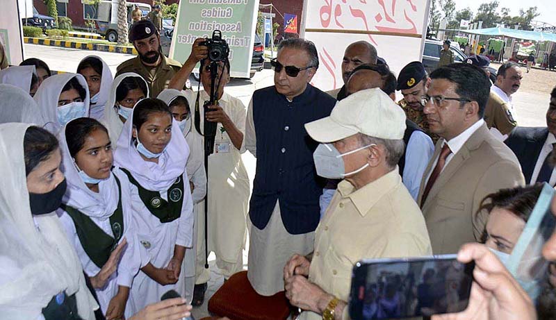 Prime Minister Muhammad Shehbaz Sharif visits free flour distribution point.