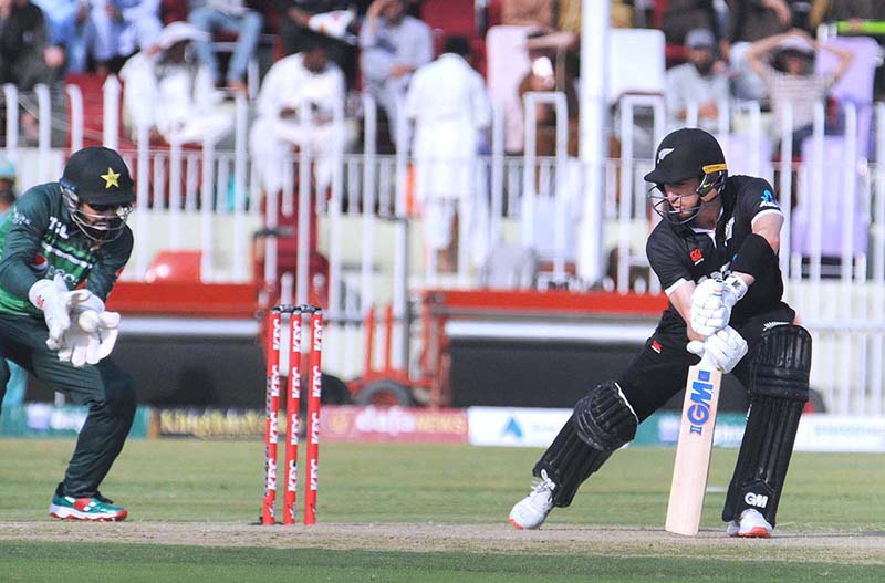 The Pakistani and New Zealand cricket players are seen in action during the first One Day International (ODI) match held at the Pindi Cricket Stadium