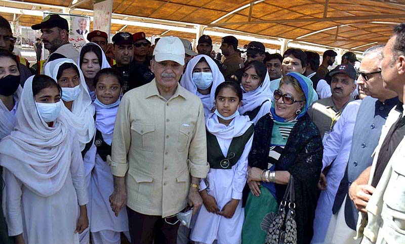 Prime Minister Muhammad Shehbaz Sharif visits free flour distribution point.