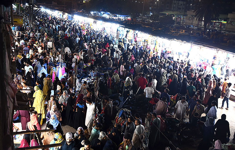 People thronged to Hyderi Market for Eid-ul-Fitr shopping