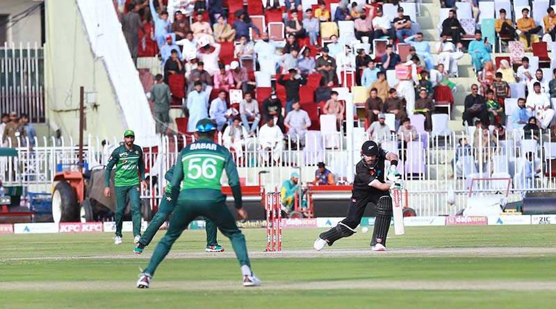 The Pakistani and New Zealand cricket players are seen in action during the first One Day International (ODI) match held at the Pindi Cricket Stadium