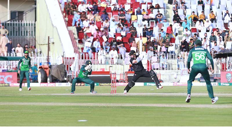 The Pakistani and New Zealand cricket players are seen in action during the first One Day International (ODI) match held at the Pindi Cricket Stadium