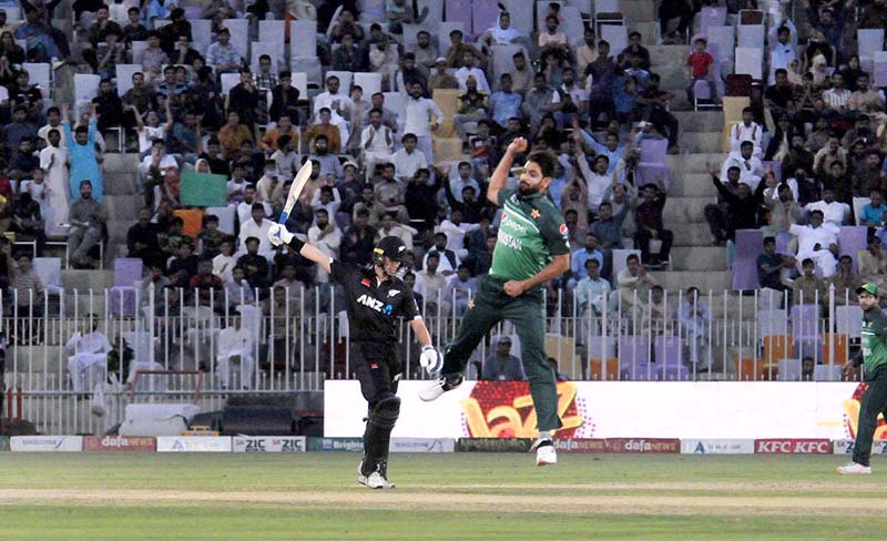 The Pakistani and New Zealand cricket players are seen in action during the first One Day International (ODI) match held at the Pindi Cricket Stadium