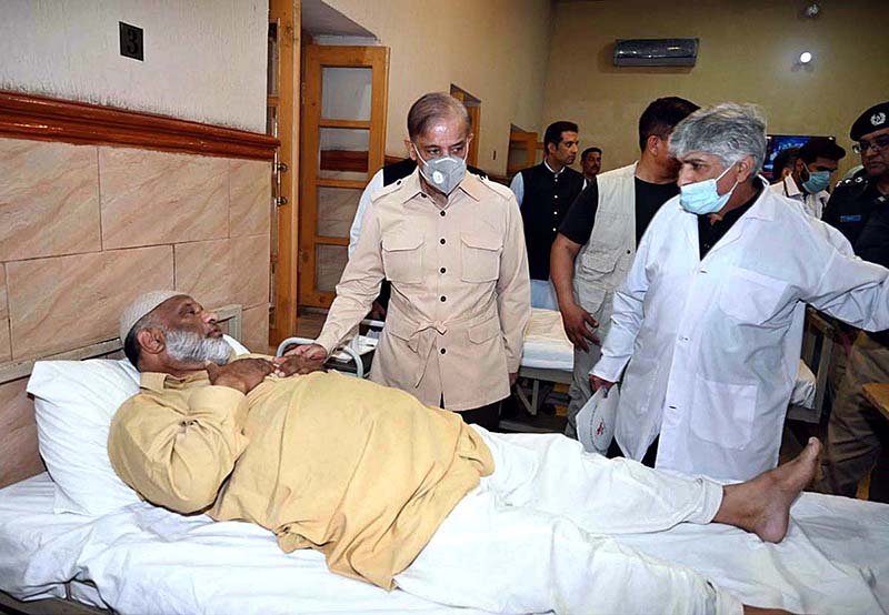 Prime Minister Muhammad Shehbaz Sharif meets patients in jail hospital and enquires about their health at Central Jail, Kot Lakhpat