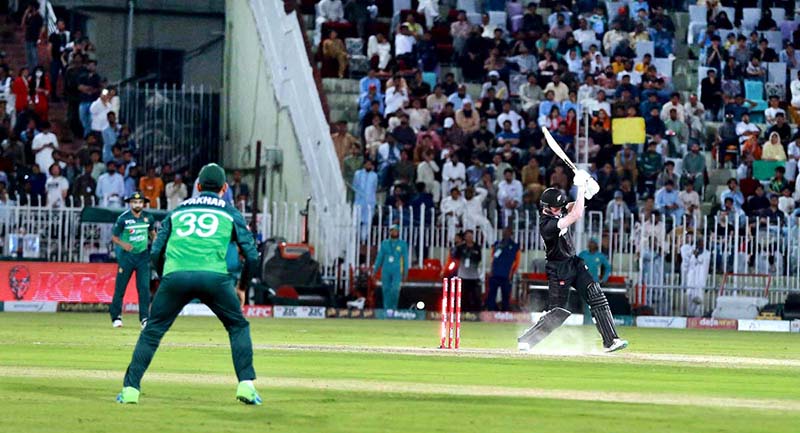 The Pakistani and New Zealand cricket players are seen in action during the first One Day International (ODI) match held at the Pindi Cricket Stadium