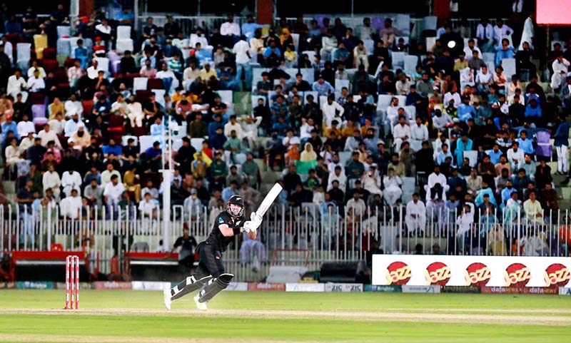 The Pakistani and New Zealand cricket players are seen in action during the first One Day International (ODI) match held at the Pindi Cricket Stadium