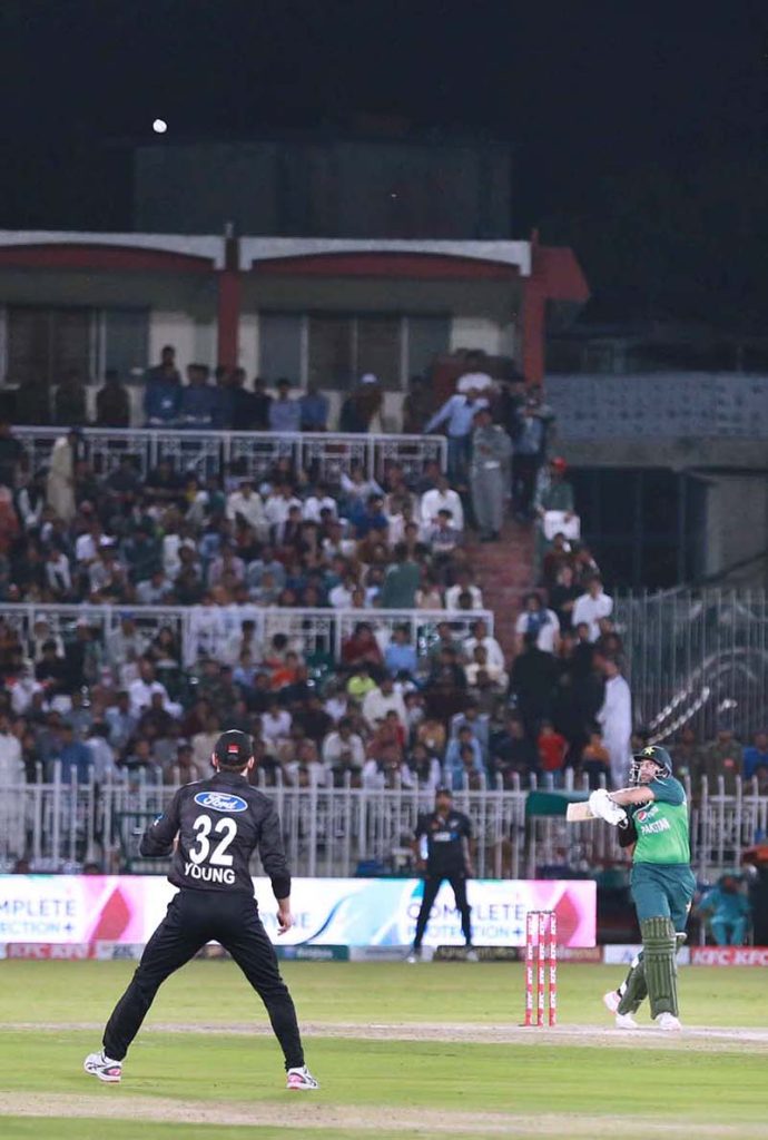 Pakistani batter skips from a bouncer delivery during the first One Day International (ODI) match between Pakistan and New Zealand at the Pindi Cricket Stadium