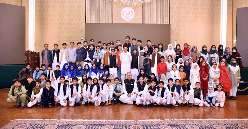President Dr. Arif Alvi in a group photo with the orphans from different organizations at the Iftar Dinner that he hosted for them on the occasion of Orphans Day, at Aiwan-e-Sadr