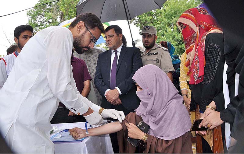Students are participating in awareness walk for Thalassemia Day at University of Sargodha