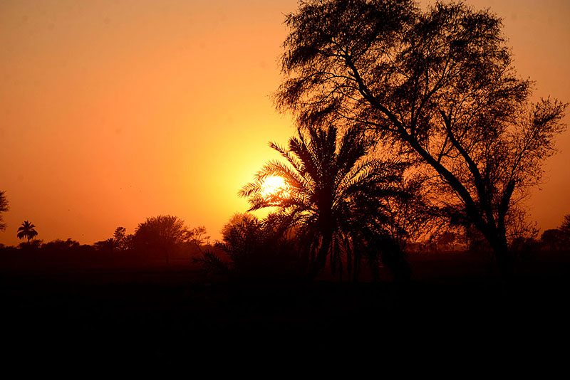 A beautiful view of sunset over the sky in the city