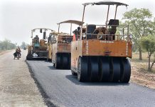 Heavy machinery being used during road construction work at Jhumra road bypass to Millat Road