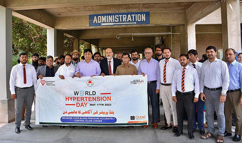 Dr. Ahmad Bilal Professor of Medicine along with faculty members and Students participating in a walk to mark World Hypertension Day at University of Agriculture Faisalabad (UAF)