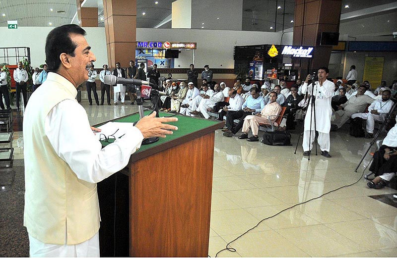 Senator Syed Yousuf Raza Gillani addressing the ceremony during the departure of pilgrims on the first Hajj flight from Multan International Airport