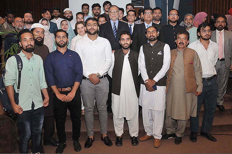 Group photo of Federal Minister for Planning Development & Special Initiatives Ahsan Iqbal during Second International Islamic Peace Conference on 'National Accord for Peace, Inclusive Education, Social Reconstruction and sustainable Economic Development' at International Islamic University