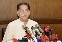 Federal Minister Mian Javed Latif addressing a press conference
