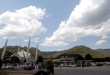 A beautiful view of clouds hovering over Faisal Masjid