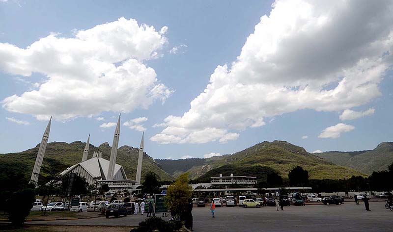 A beautiful view of clouds hovering over Faisal Masjid