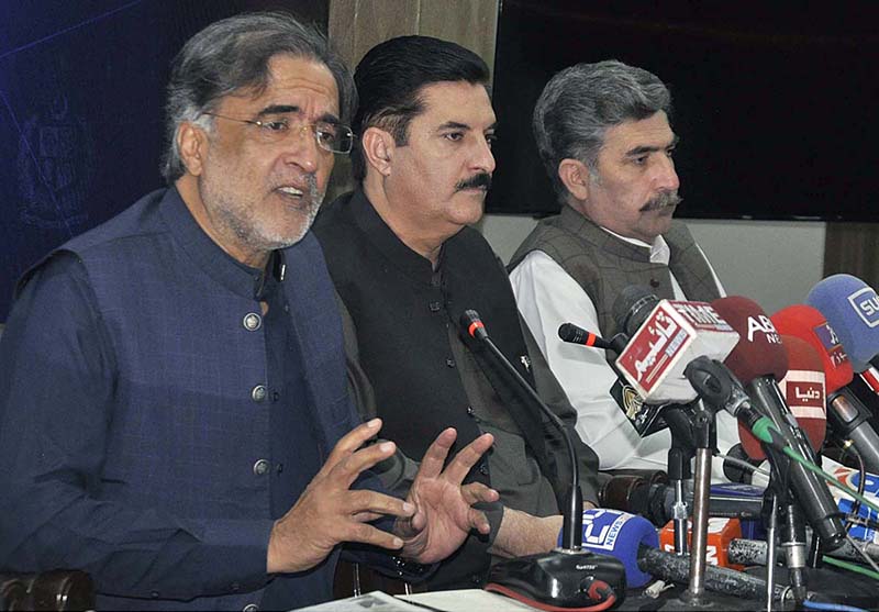 Federal Minister for Kashmir Affairs Qamar Zaman Kaira with Minister of State for Poverty Alleviation & Social Safety Faisal Karim Kundi addressing a press conference at PID Media Center