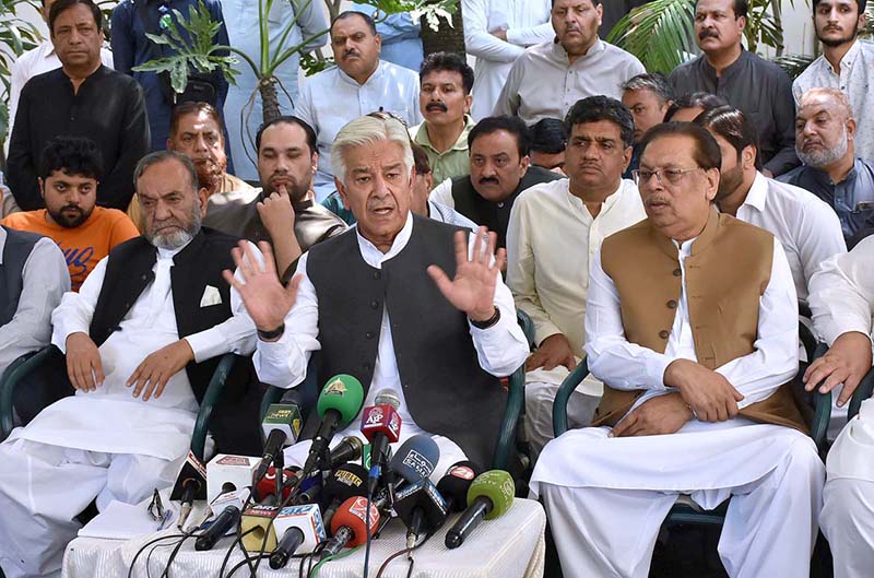 Federal Minister for Defence Khawaja Muhammad Asif addressing a press conference at his residence
