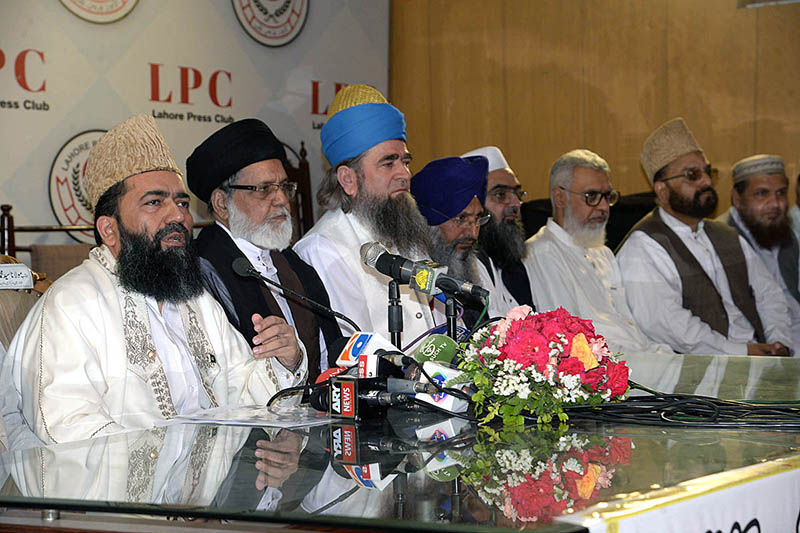 Chairman of Central Ruet-e-Hilal Committee, Maulana Abdul Khabeer Azad along with other members addressing National Unity Peace conference organized by Majlis Ulema Pakistan at press Club