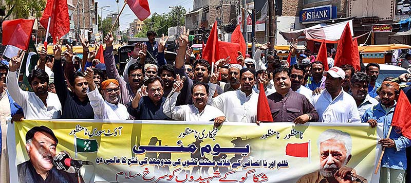 Divisional Chairman All Pakistan WAPDA Hydro Electric Workers Union Nisar Shaikh is leading a rally on the occasion of International Labour Day in front of Press Club