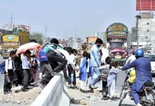 Hundreds of students daily cross the busy IJP Road due to unavailability of crossing space or pedestrian bridge, needs the attention of concerned authorities