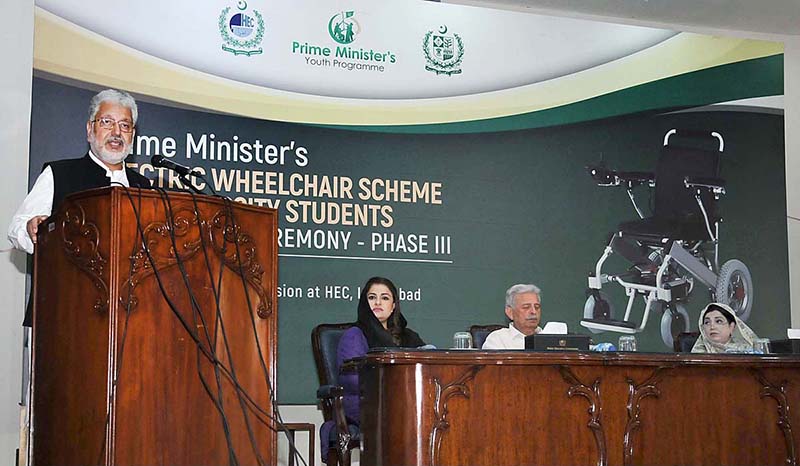 Chairman HEC Dr. Mukhtar Ahmed addressing to the Prime Ministers Electric wheelchair Scheme for University Students: Distribution Ceremony - Phase 111 organized by higher education Commission at HEC