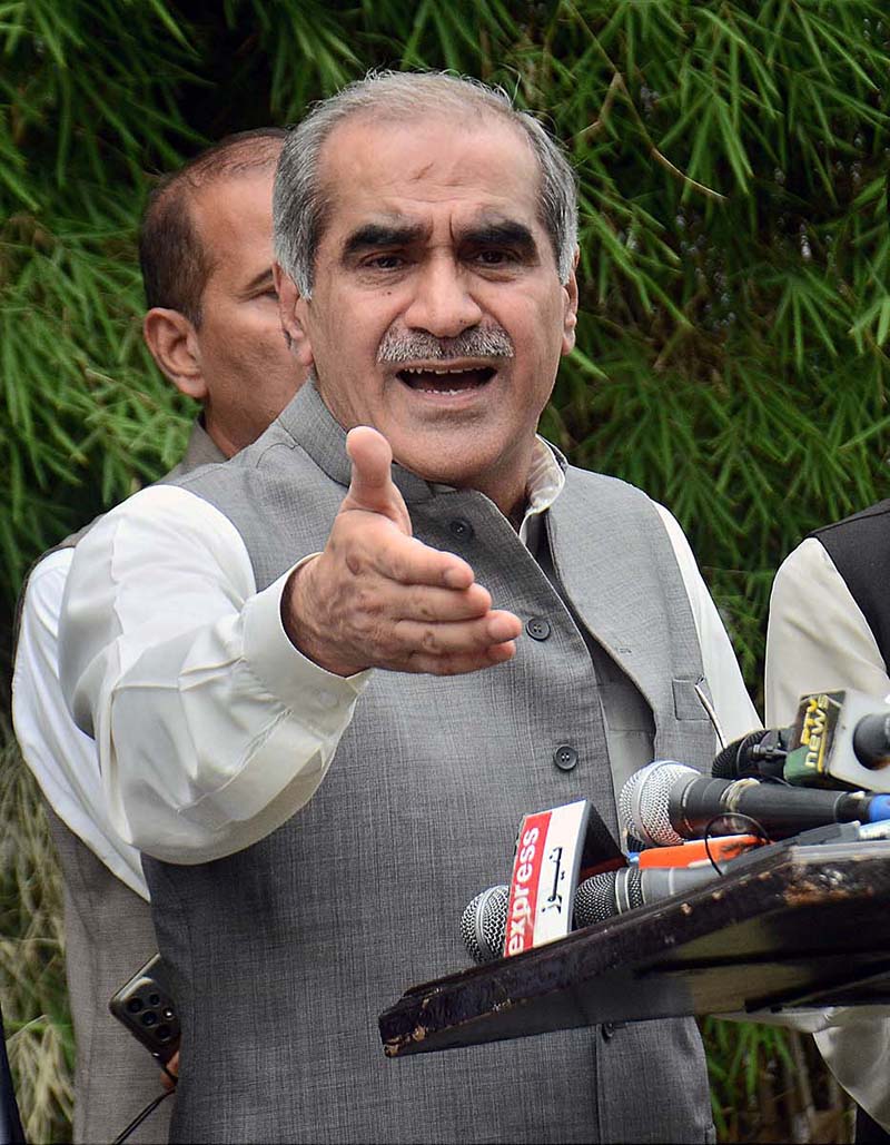 Federal Minister for Railways and Aviation Khawaja Saad Rafique talking to media persons during visit at the Jinnah House