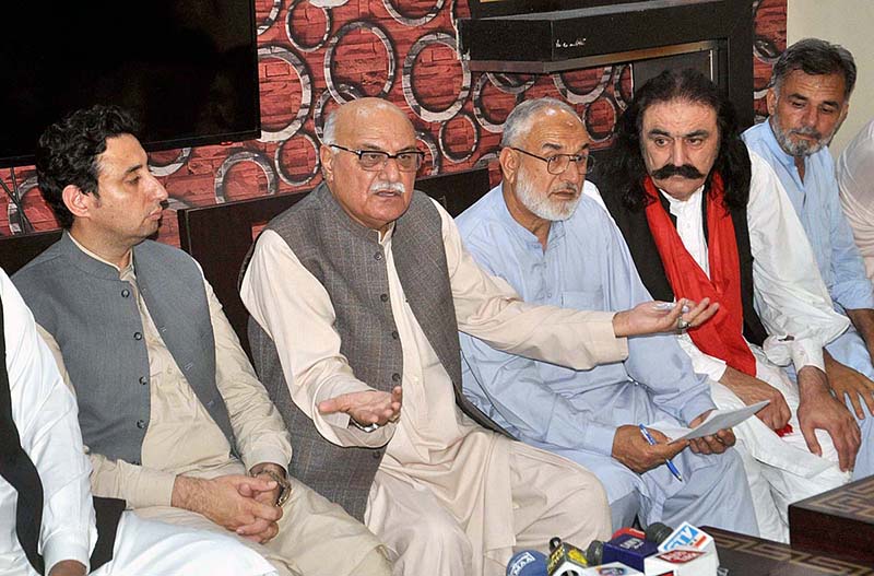 Awami National Party General Secretary (ANP) Mian Iftikhar Hussain along with others addresses a press conference at Hottie house