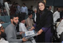 Parliamentary Secretary for Education, Professional Training Zeb Jaffar distributing wheelchairs to the participants of Prime Ministers Electric wheelchair Scheme for University Students: Distribution Ceremony - Phase 111 organized by Higher Education Commission at HEC
