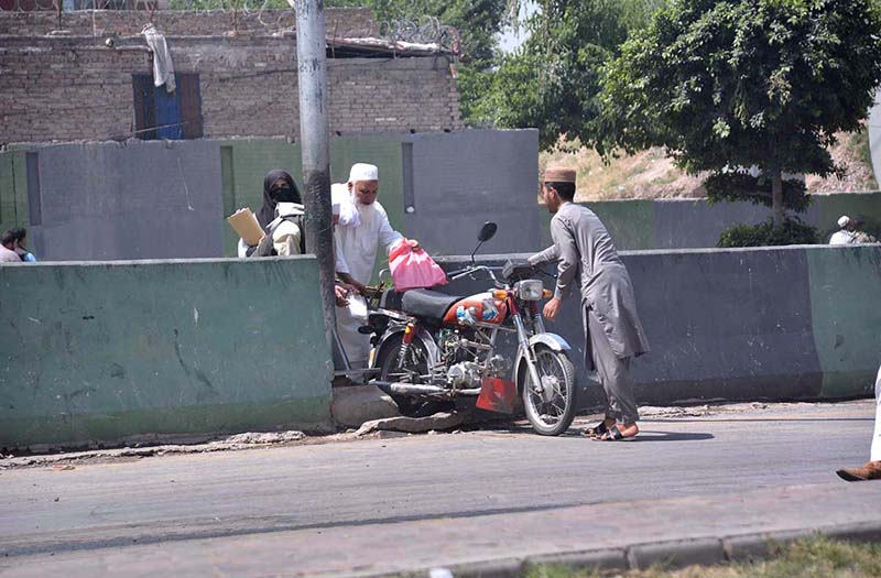 Motorcyclist crossing the road on a wrong way near Assembly Chowk