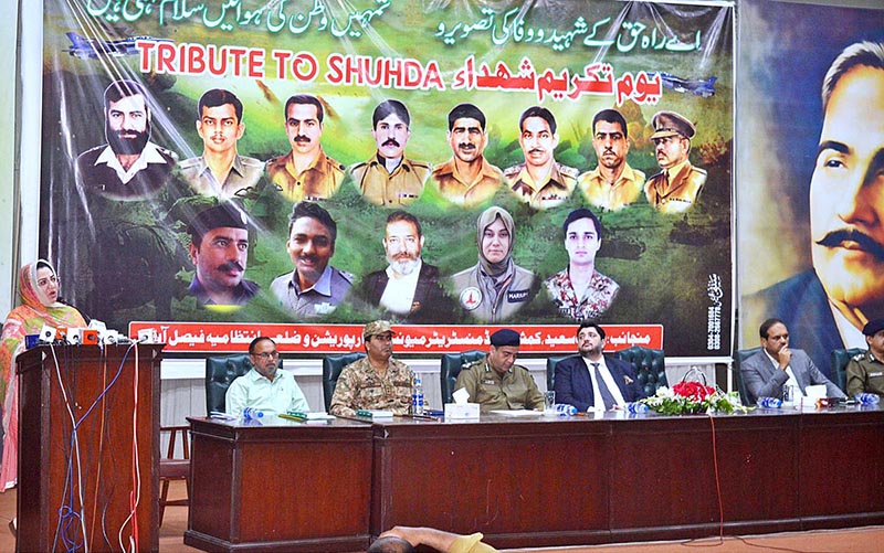 Divisional Commissioner Madam Silwat Saeed is addressing a function arranged by local administration on the occasion of Youm-e-Takreem Shuhada-e-Pakistan at Iqbal Auditorium of University of Agriculture Faisalabad (UAF)