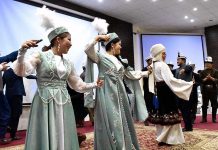 Artist of Kyrgyz presenting traditional Kyrgyz dance during the "Kyrgyz History and Cultural Show" organized by the Embassy of Kyrgyz Republic Pakistan and Overseas Kyrgyz Association Pakistan at Musharaf Hall Karakoram International University