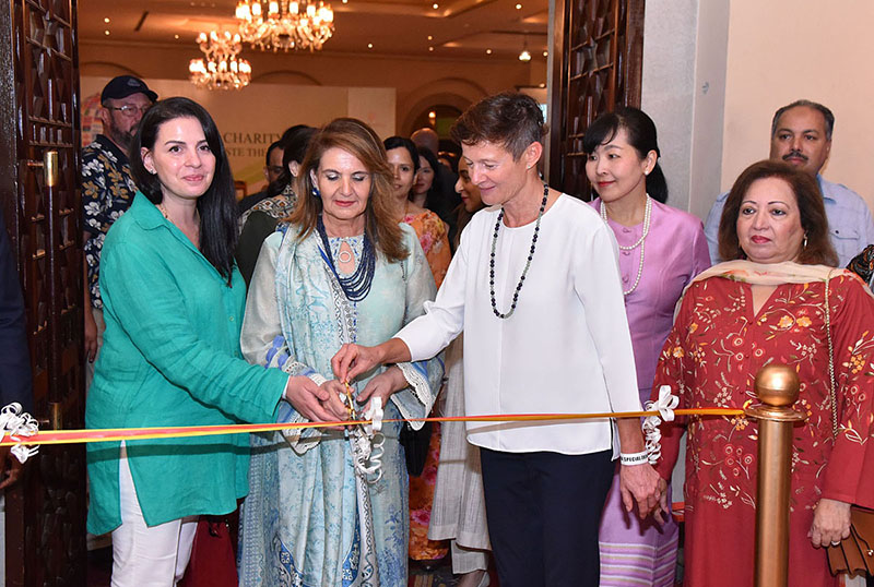 First lady Begum Samina Alvi inaugurating an international food festival at a hotel