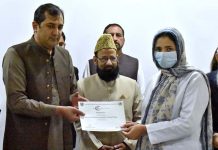 Chief Minister Gilgit-Baltistan Khalid Khurshid Khan distributing certificate among the doctors during inauguration ceremony of the College of Physicians & Surgeons Pakistan (CPSP) Regional Center Gilgit