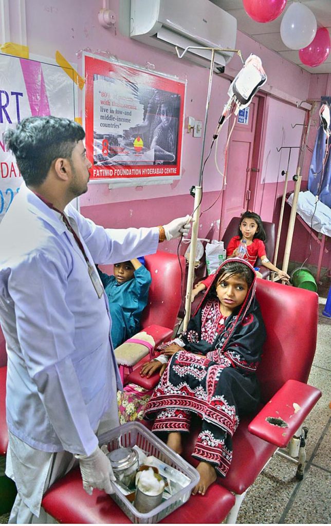 Children with thalassemia is receiving blood on International Thalassemia Day at Fatimid Foundation Center