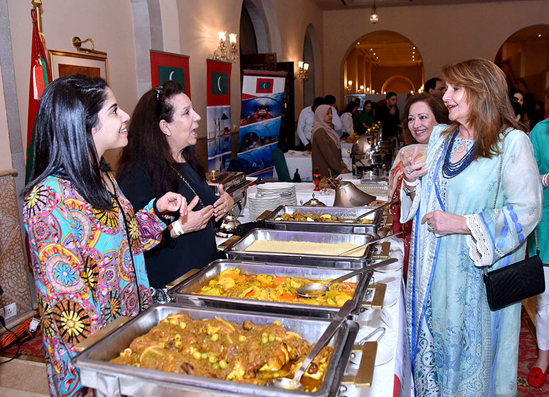 First lady Begum Samina Alvi inaugurating an international food festival at a hotel