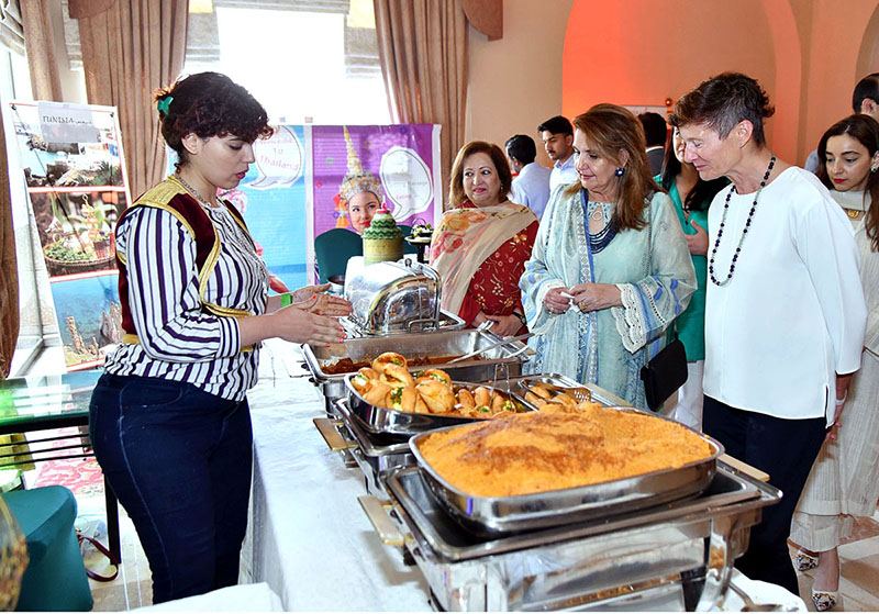 First lady Begum Samina Alvi inaugurating an international food festival at a hotel