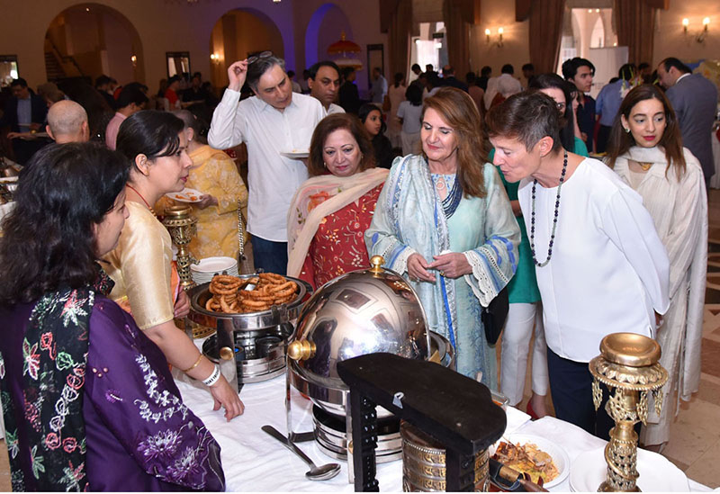 First lady Begum Samina Alvi inaugurating an international food festival at a hotel