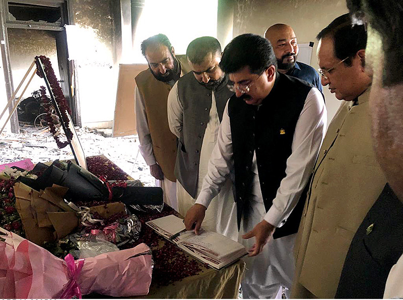 Chairman Senate Muhammad Sadiq Sanjrani recording his impressions in the visitors book during the visit at Jinnah House