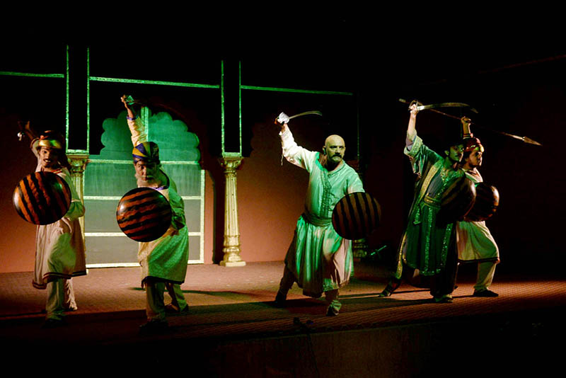 Students performing on the stage drama titled" Tipu Sultan” organized by Government College Dramatics Club at GCU