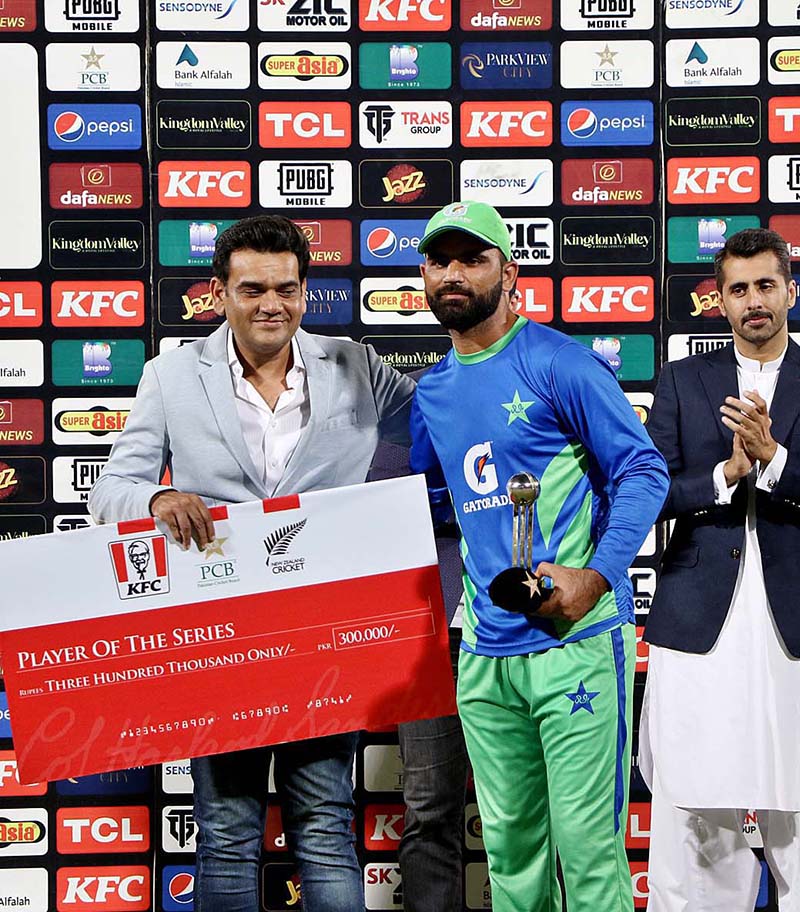 Fakhar Zaman receiving player of the series award during prize distribution ceremony of One-Day International (ODI) series against New Zealand at the National Cricket Stadium