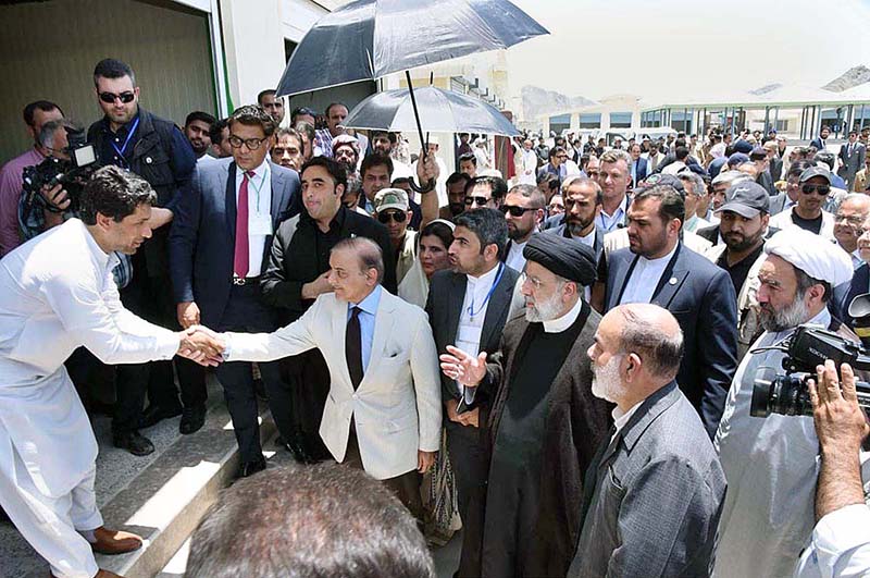 Prime Minister Muhammad Shehbaz Sharif and Iranian President Ebrahim Raisi visiting Iranian side of the Mand-Pishin Joint Border Market at Pakistan Iran Border